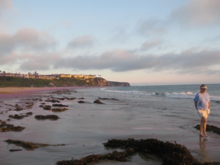 Looking south on beach with Ritz Carlton Laguna Niguel on cliff