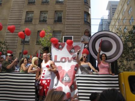 Love music float at Loveolution. Palace Hotel San Francisco in background.
