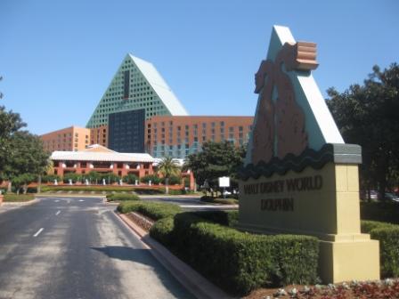 a hotel in the background with Walt Disney World Dolphin in the background