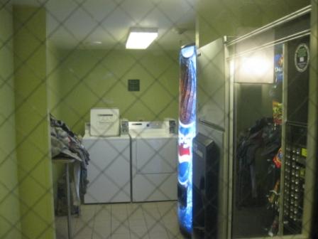 a laundry room with a washing machine