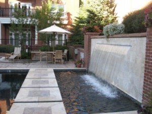 a pool with a waterfall