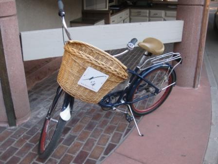 a bicycle with a basket on the front