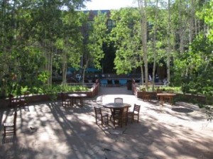 a table and chairs in a courtyard