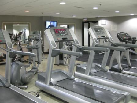 a room with treadmills and exercise machines