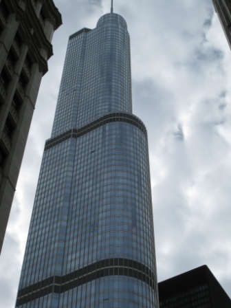 a tall building with many windows with Trump International Hotel and Tower in the background
