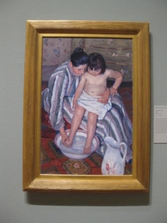 a painting of a woman washing a child's feet