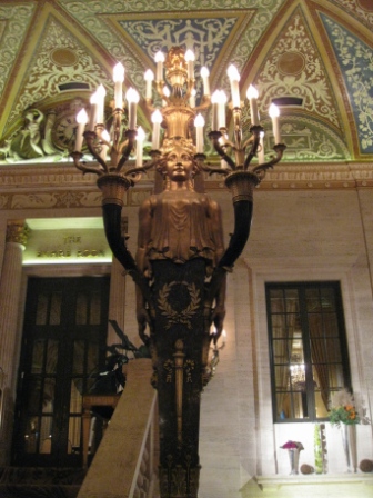 a large bronze chandelier in a room