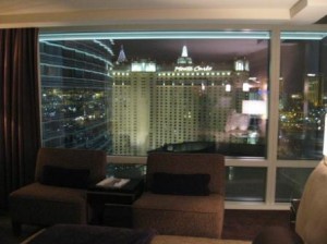 a room with a view of a city from a window