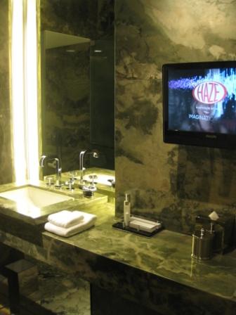 a bathroom with a television