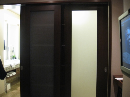 a double door with glass panels