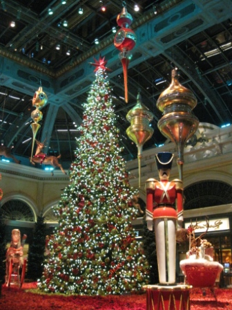 a christmas tree and nutcrackers in a mall