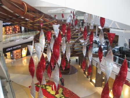 a large shopping mall with red and white decorations