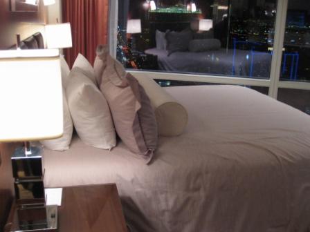 a bed with pillows on it