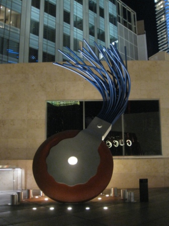a sculpture of a ball with wires