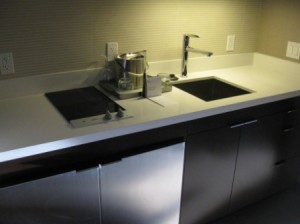 a kitchen with a sink and a stove