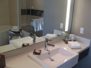 a bathroom with a mirror and sink