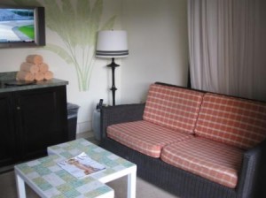 a living room with a couch and a table