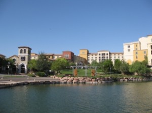 a building next to a lake