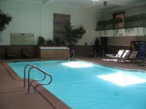 a swimming pool with a ladder