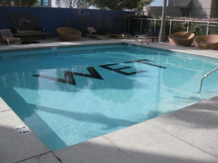 a swimming pool with a sign on it
