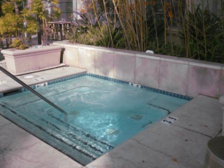 a hot tub in a pool