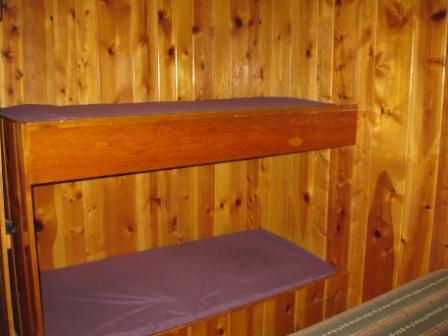 a wooden shelf in a room