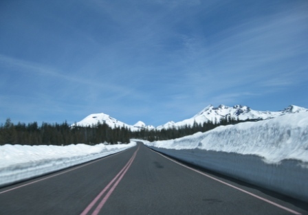 a road with snow on the side
