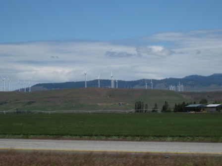 a wind turbines on a hill