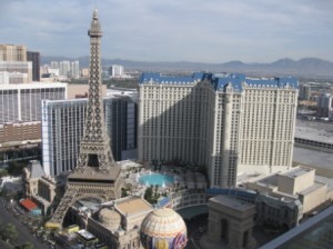 a large building with a tower in the background