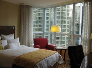 a hotel room with a large window