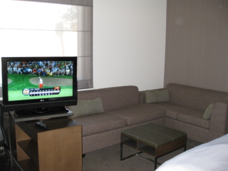 a tv on a table in a hotel room