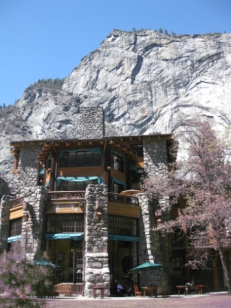 Ahwahnee Hotel with a stone wall