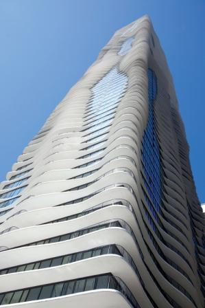 low angle view of a tall building with Aqua in the background