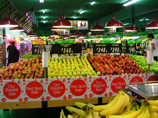 a grocery store with fruits and vegetables