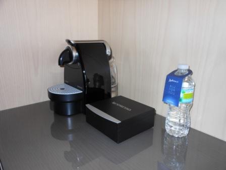 a coffee machine and a box on a table
