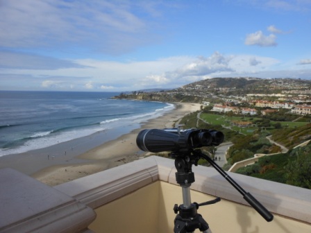 a telescope overlooking a beach