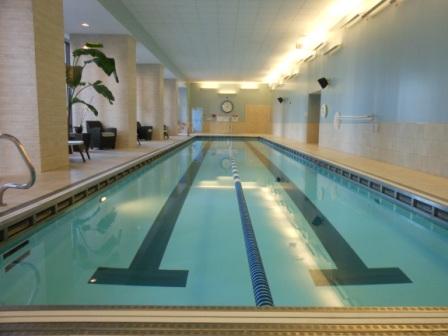 long indoor swimming pool in a building