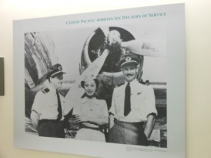 a group of people standing in front of an airplane