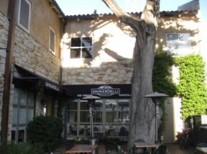 a building with a tree in the background