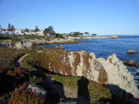 a rocky coastline with a body of water