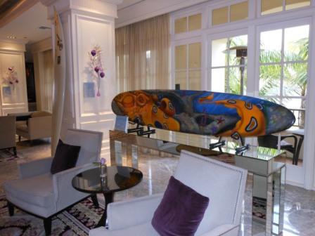 a room with a large surfboard