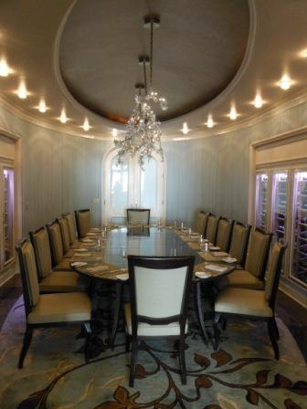 long table with chairs and chandelier