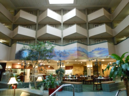 a hotel lobby with a large balcony