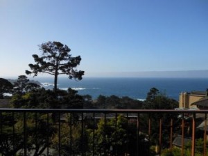 a view of the ocean from a balcony