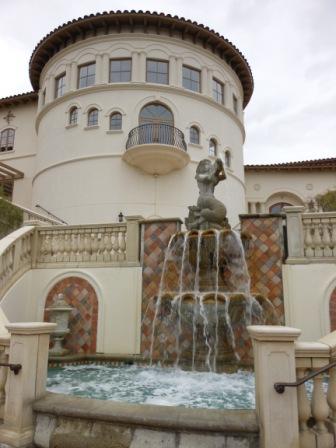 a fountain in front of a building