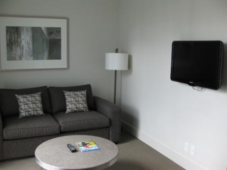 a living room with a couch and a tv