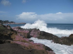 waves crashing against a rocky shore