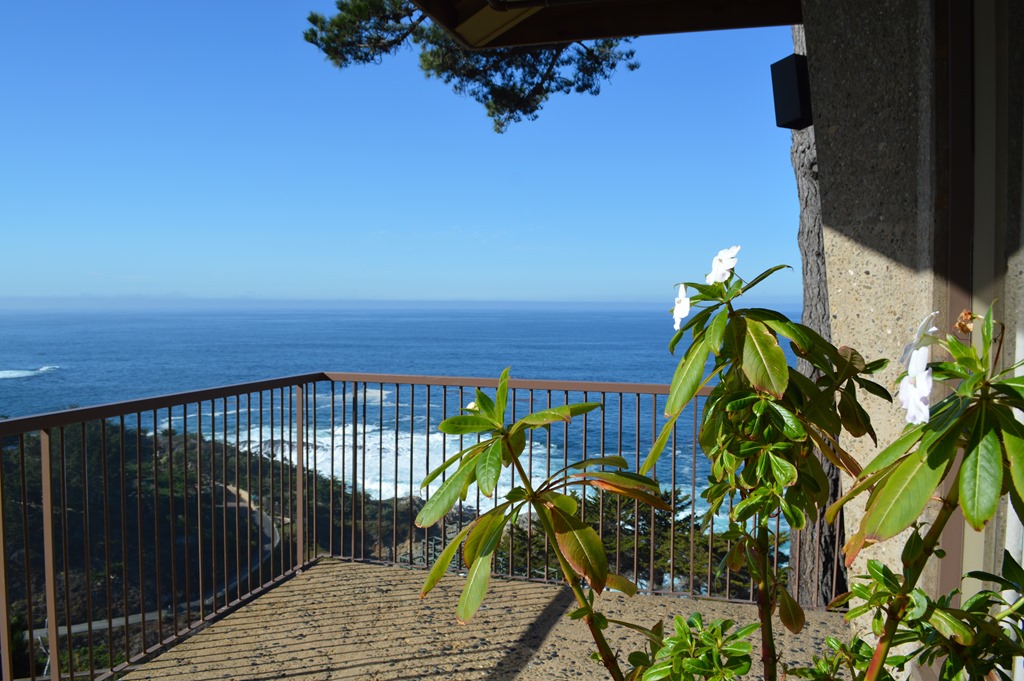 a balcony overlooking the ocean