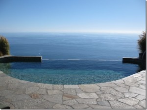 a pool with a view of the ocean