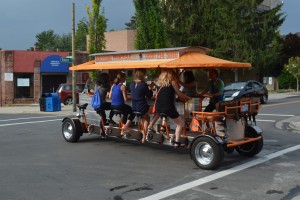 a group of people riding a bike